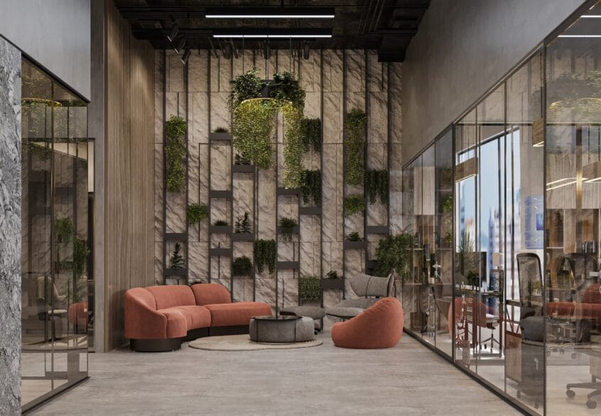 Les Meilleurs Quartiers d’Affaires au Luxembourg pour la Location de Bureaux : Plongée dans Kirchberg, Cloche d’Or et le Centre-Ville 1 Un espace détente contemporain avec un canapé en velours terracotta, un fauteuil lounge et un mur végétalisé design. Le tout est entouré de bureaux vitrés dans un intérieur industriel chic.